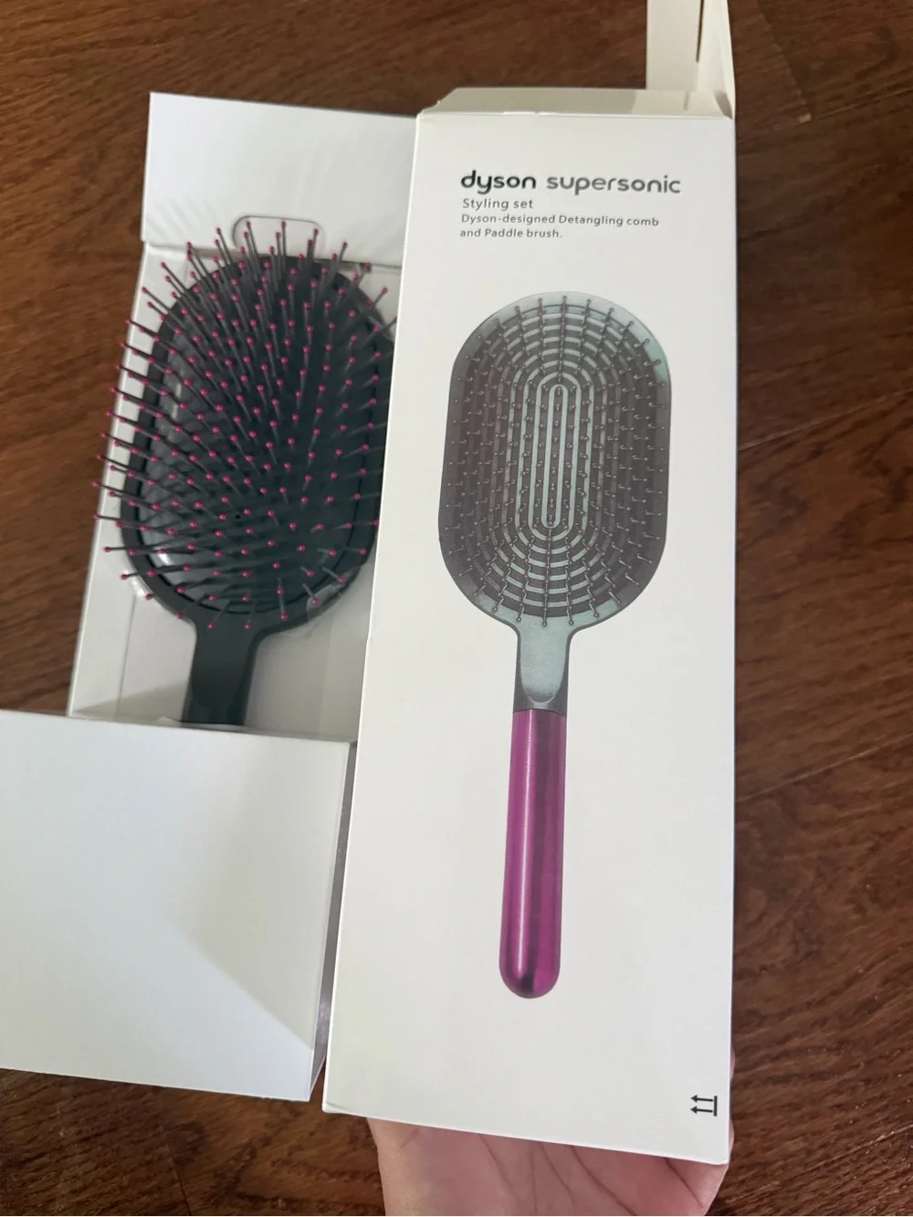 Dyson pink paddle brush with grey cushion